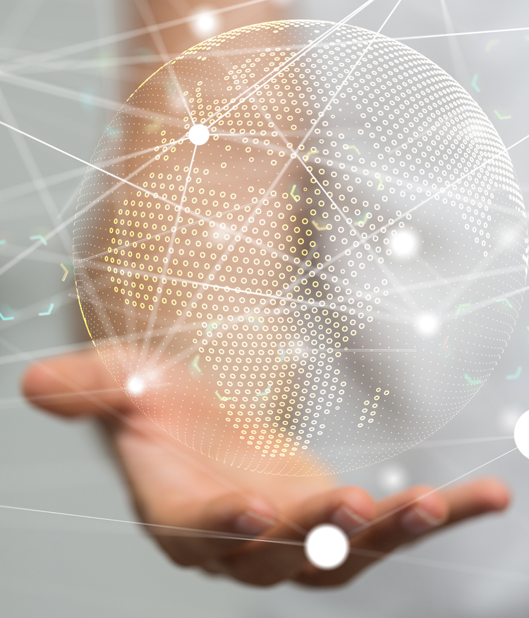 Hand holding a glowing digital globe, symbolizing global connectivity or technology.